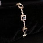 Ruva Golden Bracelet with Square Black Stones
